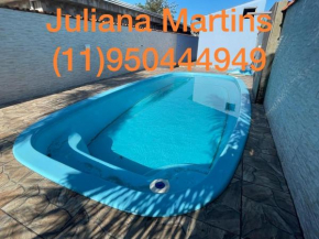 Casa com piscina com aquecedor em Mongaguá!